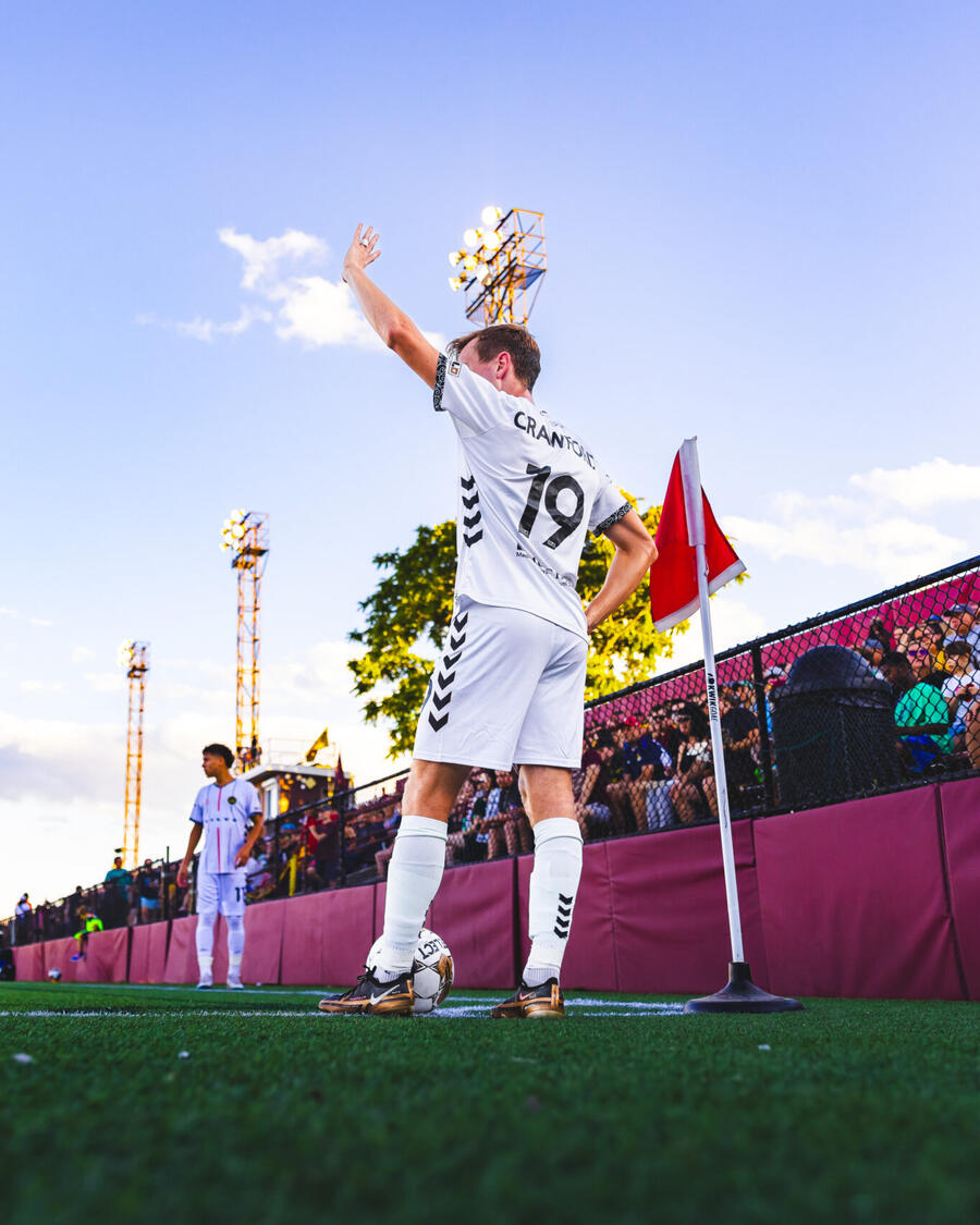 Robbie Crawford celebrating at the corner flag