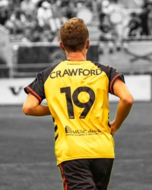 Robbie Crawford wearing the number 19 shirt on matchday